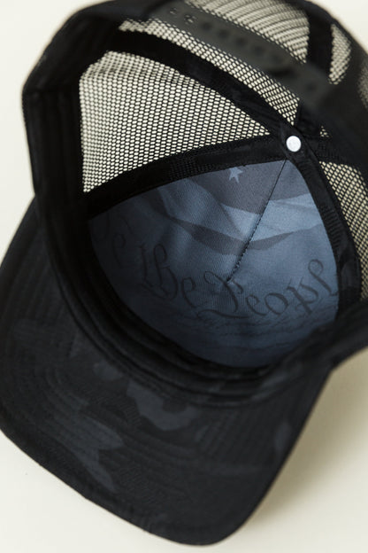 NRA® Dark Camo Trucker Circle Patch Cap