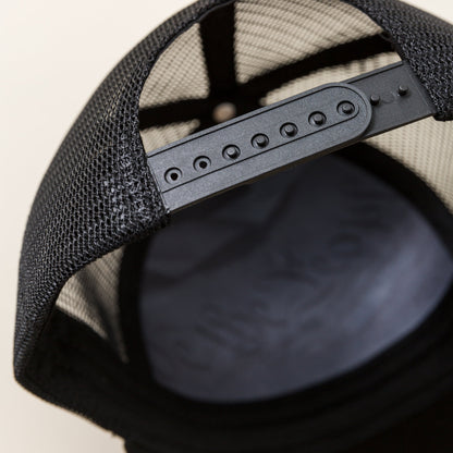 NRA® Blacked Out 6-Panel Trucker Cap with 3D Embroidered Logo